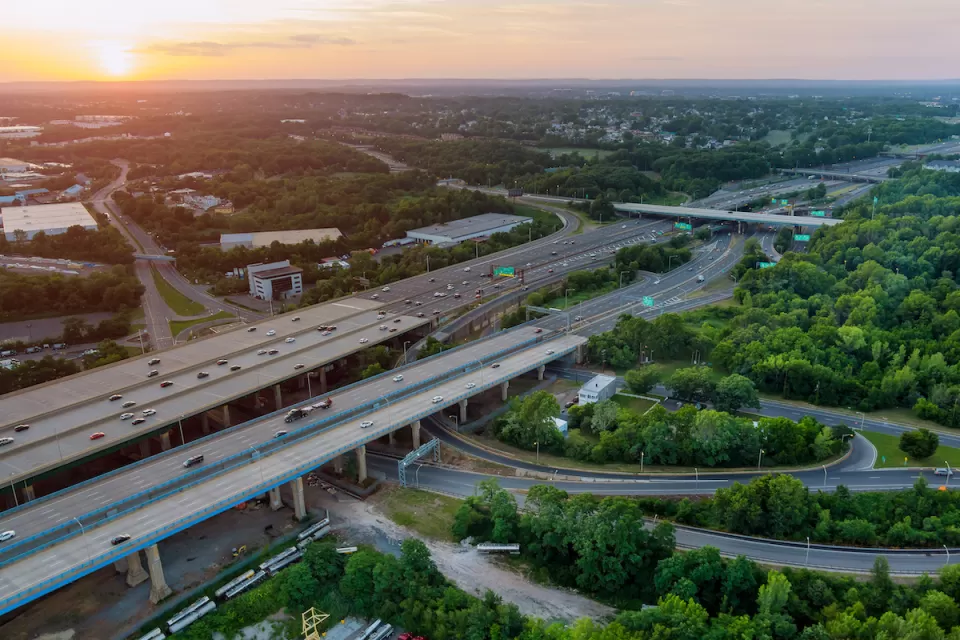 Aerial view of elevated freeways in New Jersey at dusk.